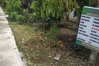 Papan proyek jalan rabat yang belum di PHO