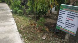 Papan proyek jalan rabat yang belum di PHO